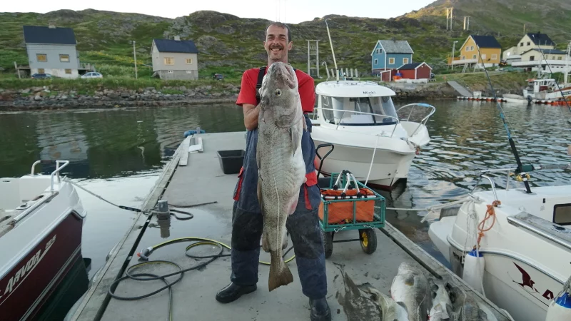 Akinos und sein erster Fisch des Tages