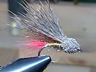 Muddler
 10 Hayabusa Schwänchen Polarfuchs Rot, Körper Ice Dub Golden Brouwn von Hareline 1.Schwinge Polarfuchs braun Kopf Rehhaar Winter Natur